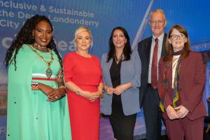 Lilian Seenoi-Barr, Mayor of Derry City and Strabane District Council; Michelle O’Neill, First Minister; Emma Little-Pengelly, deputy First Minister; Hilary Benn, Secretary of State for Northern Ireland; and Dr Caoimhe Archibald, Finance Minister.